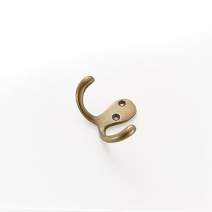 Solid brass wall hooks. Ideal for small spaces to hang coats, clothes and towels. Supplied with fixings. Great bathroom decor hooks image 2