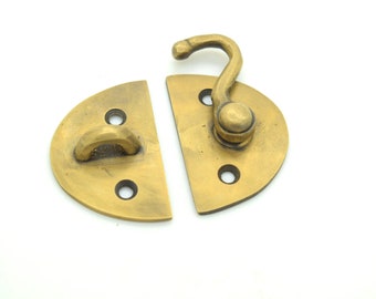 Solid brass cupboard door latch / catch.  Choose from over 5 small catches. Perfect for kitchen doors, furniture or small storage areas.