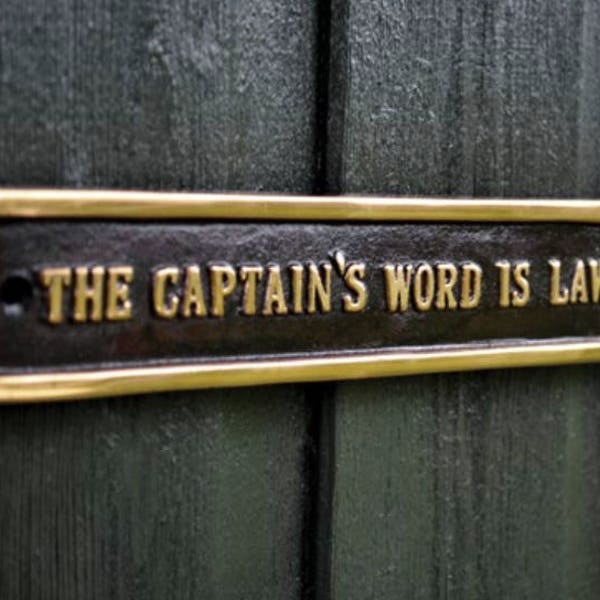 The Captains word is law ! Solid brass sign. Great for the office or man cave. Unique sticking filler from the foundryman