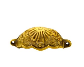 Ornate brass handles and pulls, ideal upgrade for kitchens and cabinets, by The Foundryman.