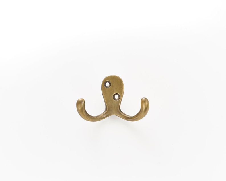 Solid brass wall hooks. Ideal for small spaces to hang coats, clothes and towels. Supplied with fixings. Great bathroom decor hooks image 1