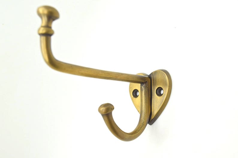 Wall hooks . x1. Brass door hooks,.Clothes coat hooks. Bedroom decor. Wall art. Brass handles. Drawer handles . Towel hooks . Vintage brass image 1