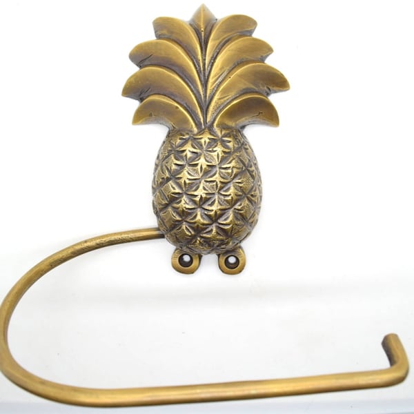 Pineapple bathroom decor. Loo roll holders made from solid brass supplied with fitting screws.Choose from 5 designs.