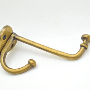 Wall hooks . x1. Brass door hooks,.Clothes coat hooks. Bedroom decor. Wall art. Brass handles. Drawer handles . Towel hooks . Vintage brass image 3