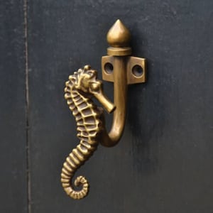 nursery decor wall hooks. Seahorse brass towel hooks. Bathroom and hallway coat hooks in brass, great for small gift ideas and home decor
