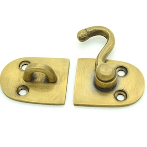 Small brass door latch. Perfect for kitchen doors and furniture up cycling projects. All hardware comes with screws. 5 + latches to choose
