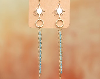 Gold Sun Tassel Earrings with Blue Cubic Zirconia Crystals