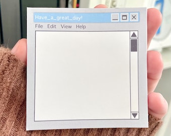 May include: A white notepad with a blue title bar that says "Have a great day!" and the words "File Edit View Help". The notepad has a grey border and a white interior with a grey border around the writing area. There are minimise, maximise, and close buttons in the title bar. There are up and down arrows on the right side of the notepad.