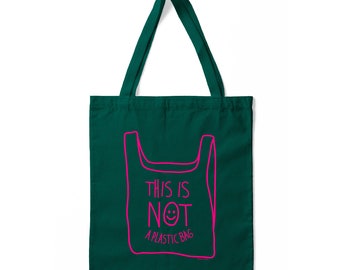 NOT A PLASTIC tote is a eco vegan friendly reusable grocery bag, market bag or gym bag. Say No Plastic with this anti plastic tote.