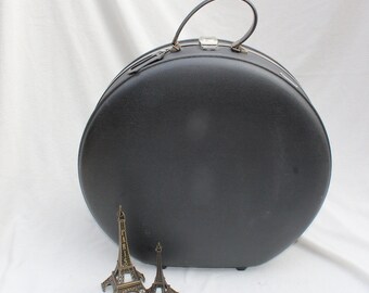 american tourister round suitcase