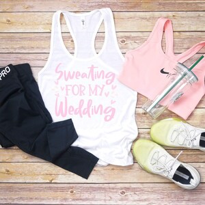 Sweating for my wedding . Ladies next level tank. Work out tank. Gym shirt