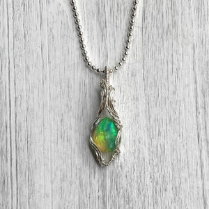 Wire wrapped pendant- Green Aurora Opal doublet wrapped in sterling silver wire