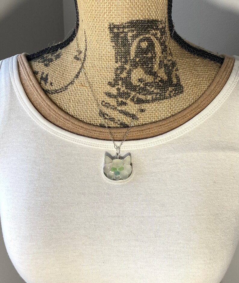 Silver tone kitty cat pendant with embedded authentic sea glass mosaic