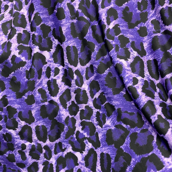 Purple 4 Way Stretch Leopard Animal Print on Tie dye Nylon Spandex Fabric sold by yard.