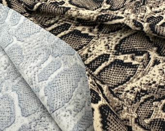 Snake print fabric Brown/Beige snake print on poly spandex fabric 4 way stretch. Sold by yard