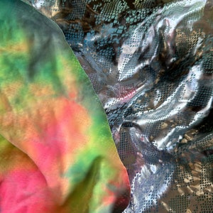 Metallic snake tiedy fabric 4 way stretch 60” wide sold by the yard. 3 colors avay