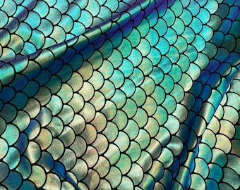 Mermaid fish scales iridescent green/purple/gold tones metallic foil fabric sold by yard. 60” wide