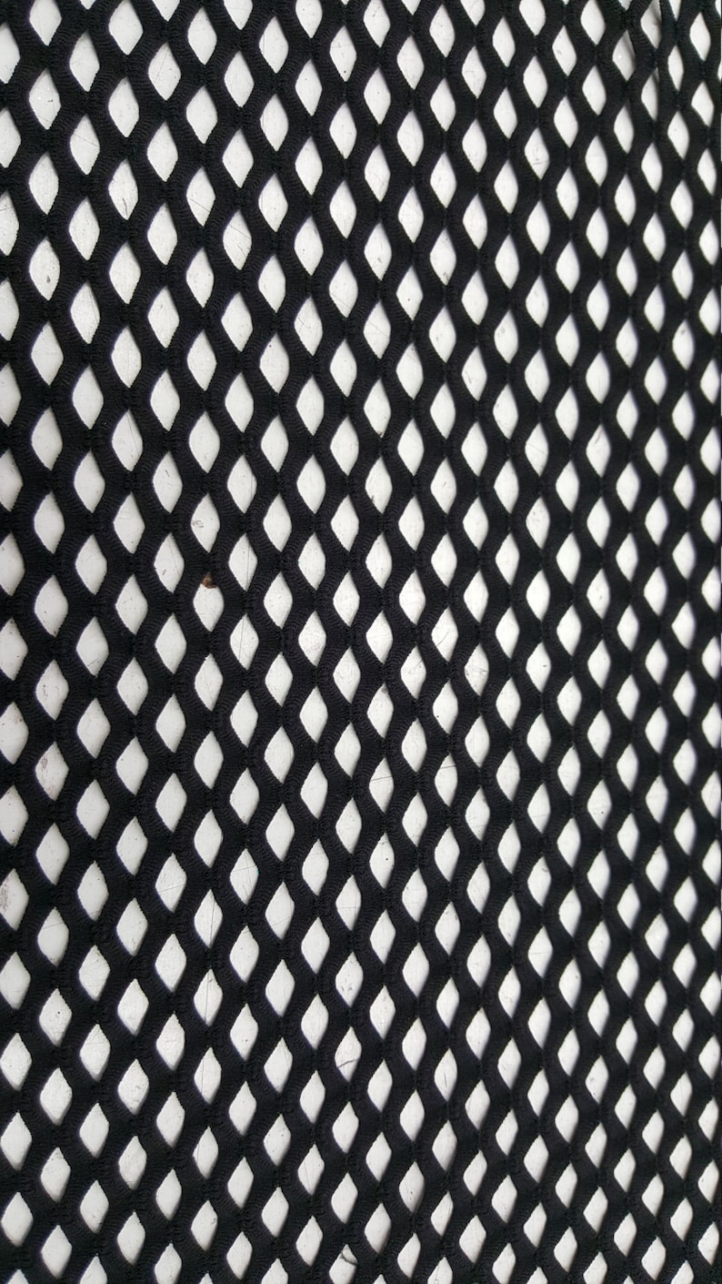 May include: Black diamond-shaped mesh fabric with a white background.