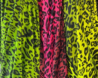 Nouveau tissu spandex extensible dans les 4 sens à imprimé guépard/léopard vendu par mètre. Imprimé guépard ombré, couleurs vives (tissu de 60 po. de large)