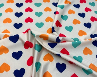 New hearts print nylon spandex fabric 4 way stretch 60” wide. Sold by yard
