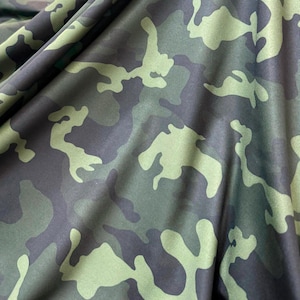 Green Camouflage Print poly Spandex fabric 4 way Stretch , 60 inch, fabric sold by the yard( camouflage print)