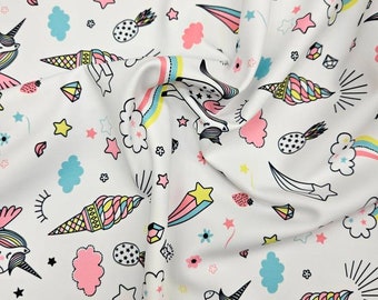 Wonderland unicorn print white nylon spandex base fabric 4 way stretch 60” wide fabric sold by yard