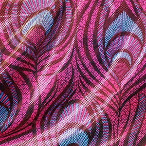 4 Way Stretch Peacock Animal Print Nylon Spandex Fabric with metallic dots sold by yard
