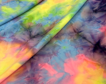 Tie dye nylon spandex 4 way stretch fabric sold by yard. 60” wide fabric