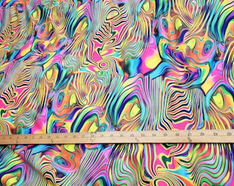 Spandex con estampado psicodélico aceitoso multicolor, vendido cortado a medida