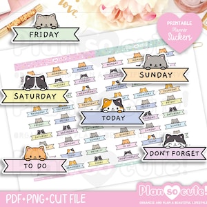 May include: A sheet of printable planner stickers featuring various pastel-coloured banners with cartoon cat illustrations. The stickers include text labels such as Friday, Saturday, Sunday, Today, To Do, and Don't Forget, arranged in rows on a white background.