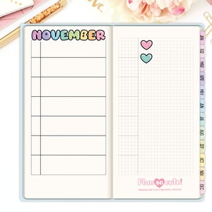 May include: A monthly planner page with a colorful "NOVEMBER" title and a gridded section for daily notes. The page also includes a small section with two hearts, one pink and one teal.