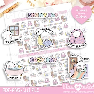 May include: A sheet of printable planner stickers featuring cartoon characters in winter-themed activities. The stickers include text labels such as Snowy Day, Hot Chocolate, Cozy Blanket, Warm Bath, and Cozy Reading, with pastel-colored illustrations.