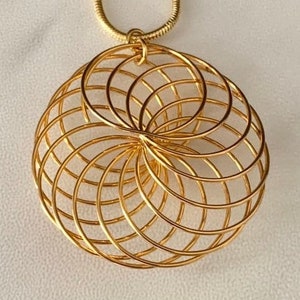 Spun gold wire pendant, 1 1/2&quot; diameter pendant using 20 ga wire with a 14k gold filled snake chain