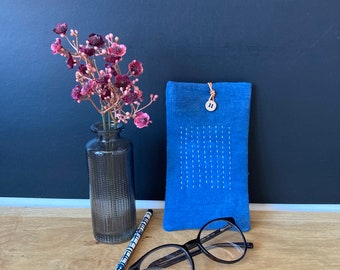Case with glasses in linen dyed with natural indigo, sashiko embroidery.