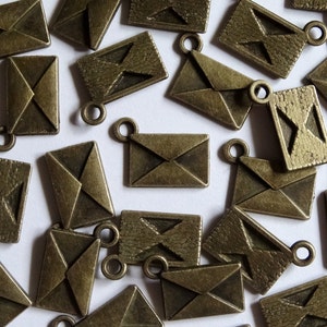 10 antiguo oro joyas de Metal envolvente encantos 9x13mm