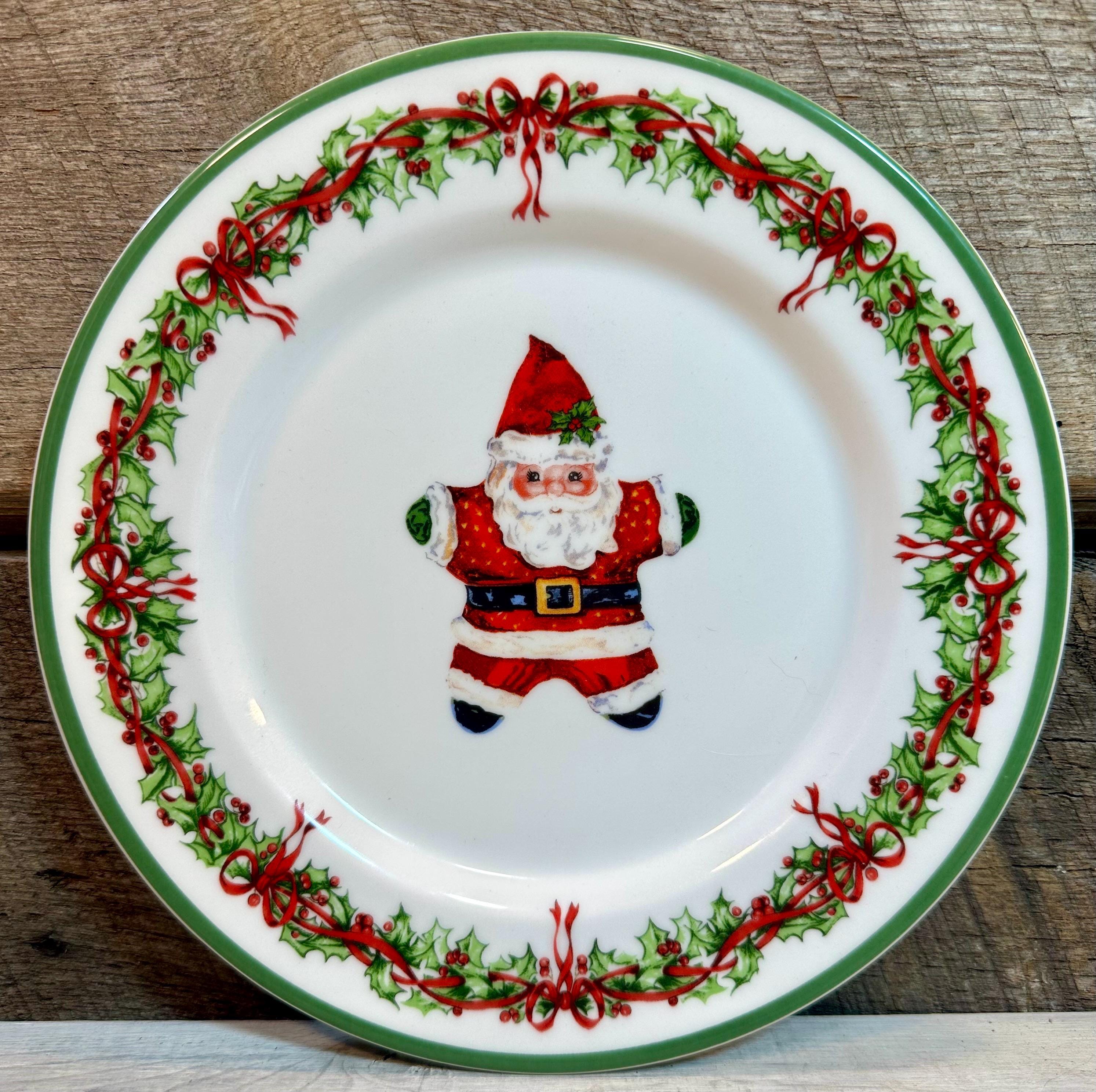 Set of 4 (Four) SALAD PLATES in the Holiday Celebrations (Green Trim) Pattern by Christopher Radko, Santa, Boot, Gingerbread House, Snowman,