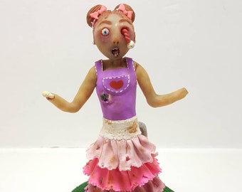 Creepy zombie girl figurine