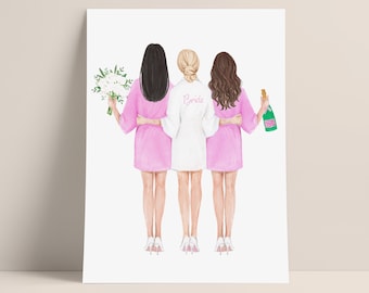 Puede incluir: Tres mujeres con batas, una de ellas lleva una bata blanca con la palabra "Bride" escrita en ella, están juntas. La mujer de la izquierda lleva un ramo de flores blancas, y la mujer de la derecha lleva una botella de champán.