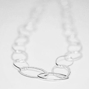 Long silver necklace, hammered & plain ovals .