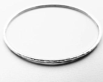 Silver stacking bangle/hammered texture