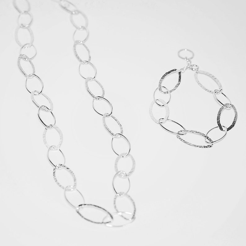 Long silver necklace hammered /& plain ovals .