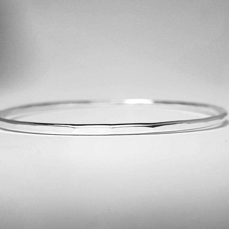 Silver sturdy stacking bangle faceted texture image 1