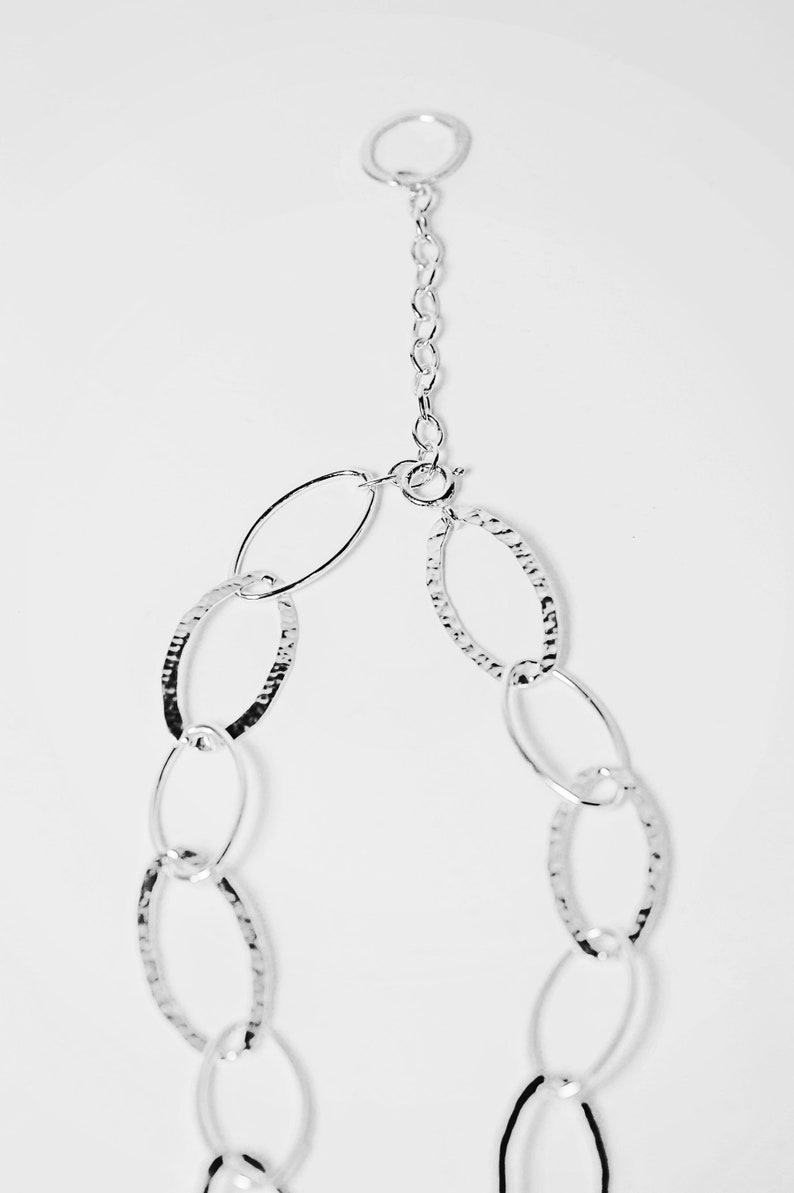 Long silver necklace hammered /& plain ovals .