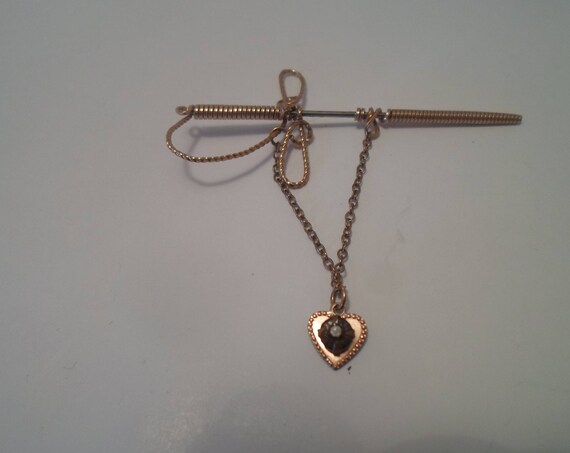 Vintage Antique Gold Plated Wire Sword Scarf or Lapel Pin with trailing Heart Charm WWII Soldier Sweetheart Pin