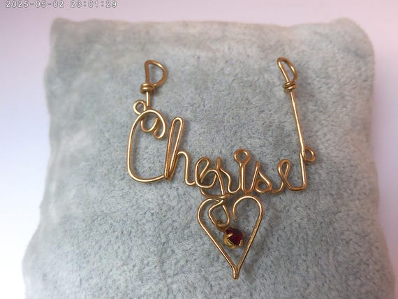 Unique vintage 80's gold tone with red rhinestone drop Cherise pendant for necklace