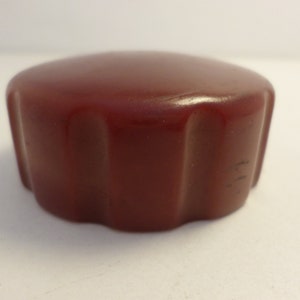 2 inch vintage deco water jar radiator bakelite cap in cranberry red
