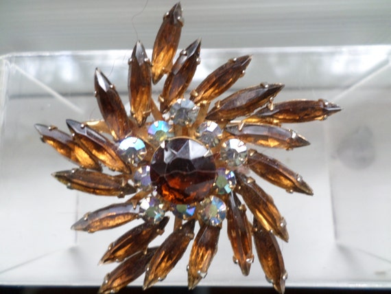 Vintage Pinwheel spray of marquee cut amber topaz rhinestones Brooch PIN borealis stones in center circa 60's