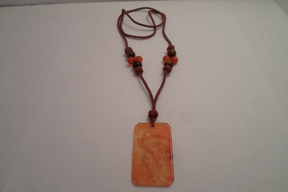 Vintage 1970's Carved Agate Glass Pendant Geisha Girl Flowers with beaded Rope Necklace Stunning Organic Colors