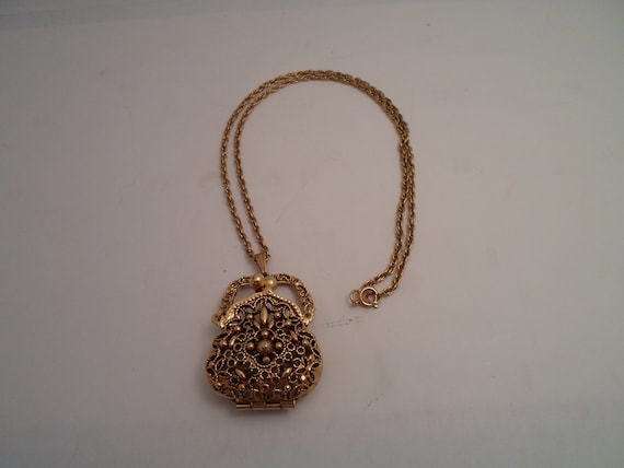 vintage Purse Pendant Necklace Pierced Gold Filigree Metal 24" rope Chain Adorable in Great Condition Opens and closes allows storage