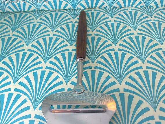 MCM Stainless and teak wood cheese pull slicer Norway Rustfri embossed beautiful Danish modern design